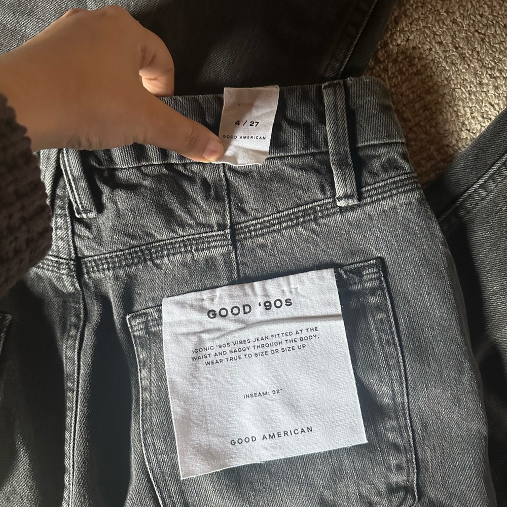 Good American 90s Jean in a dark grey wash, size 4/27, new with tags.